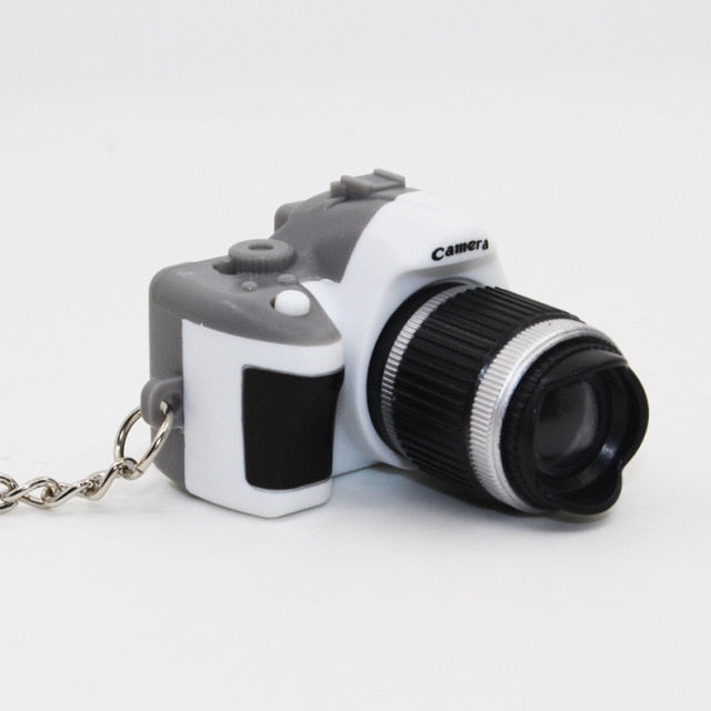 Funny shooting props luminous vocal keychain mini camera SLR TV led luminous toy keychain necklace hip hop men women